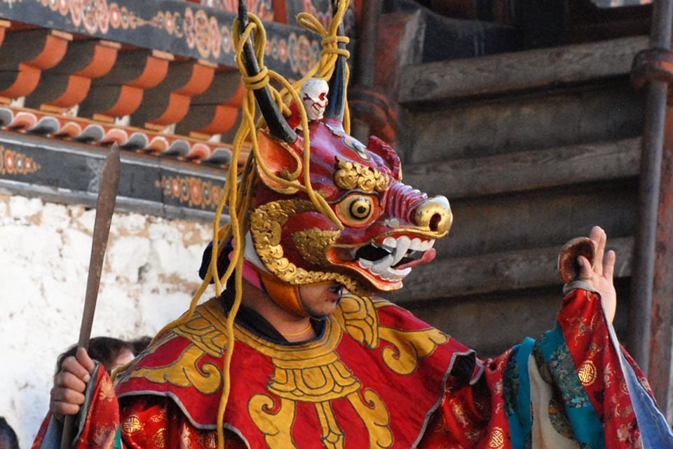 Danser tijdens religieus festival, Bhutan