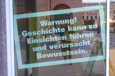 Waarschuwing geschiedenis in Leipzig | Foto: reisleider Bart